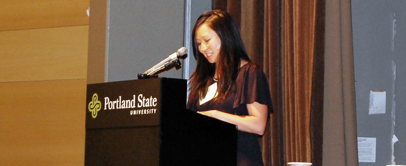 hau hagedorn standing at a lectern