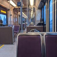 the interior of a train mostly empty