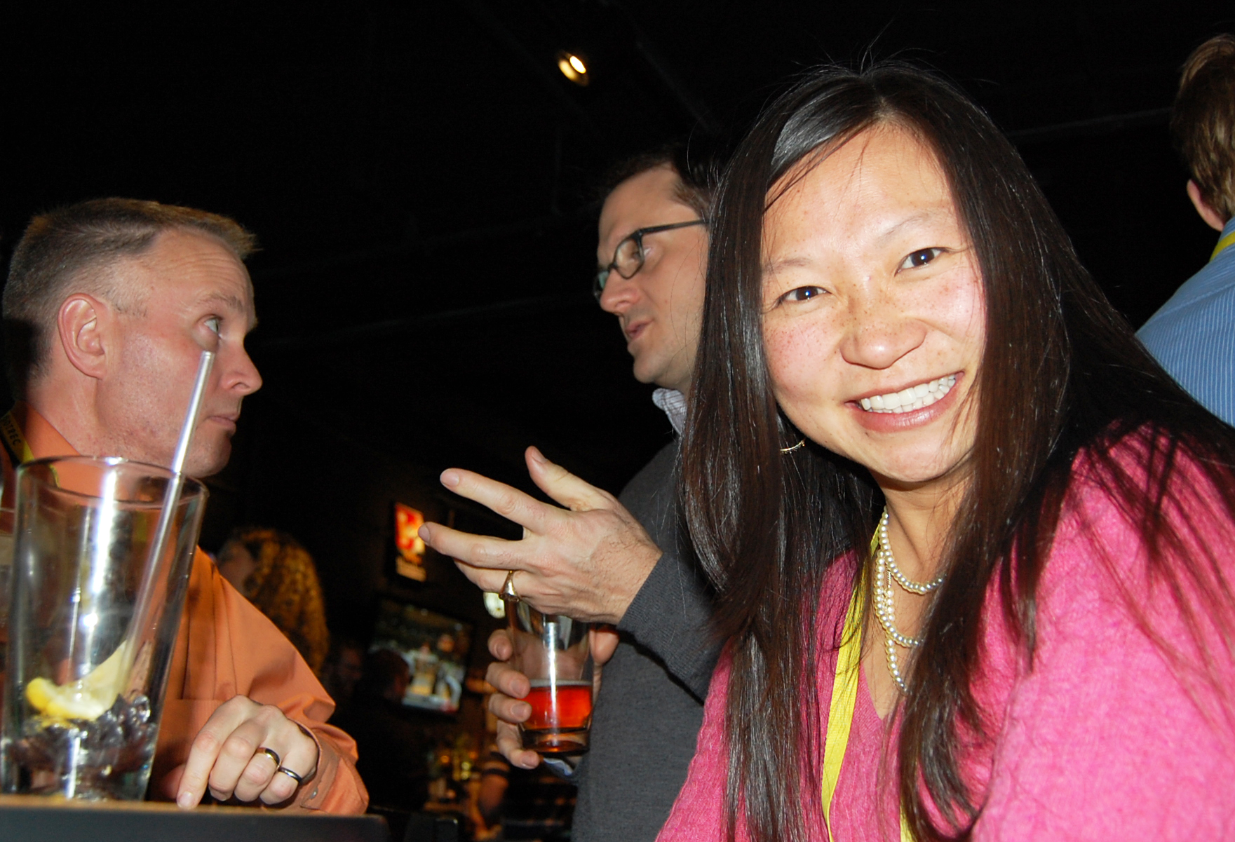 three people at a reception